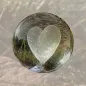 Preview: Kristallglaskugel lupenrein mit einem gelasertem Herz in der Mitte, Glaskugeldurchmesser 60 mm.